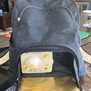 Working Medela motor with plus and battery pack